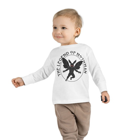 Child wearing a white long-sleeve shirt with 'The Legend of Mothman' design on a white background